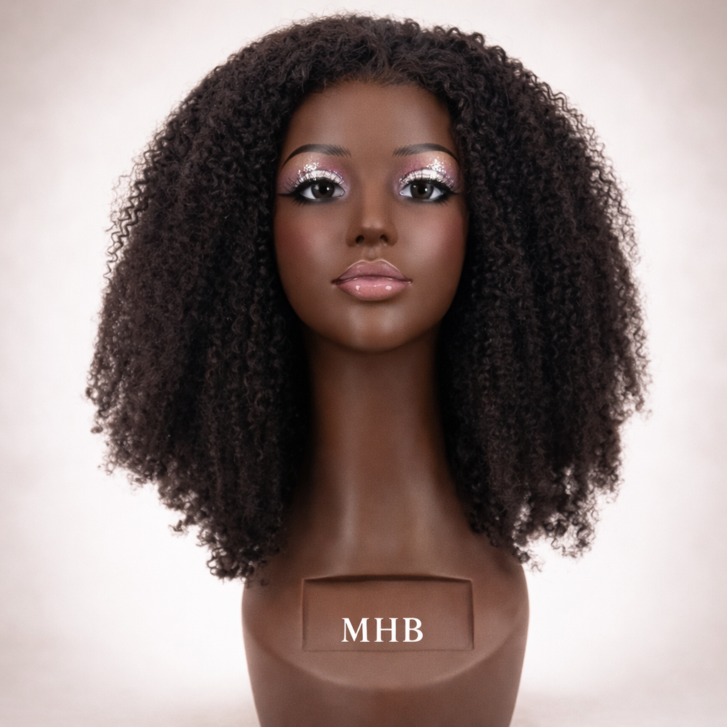 Mannequin head with curly hair styled on a plain background, branded 'MHB'.