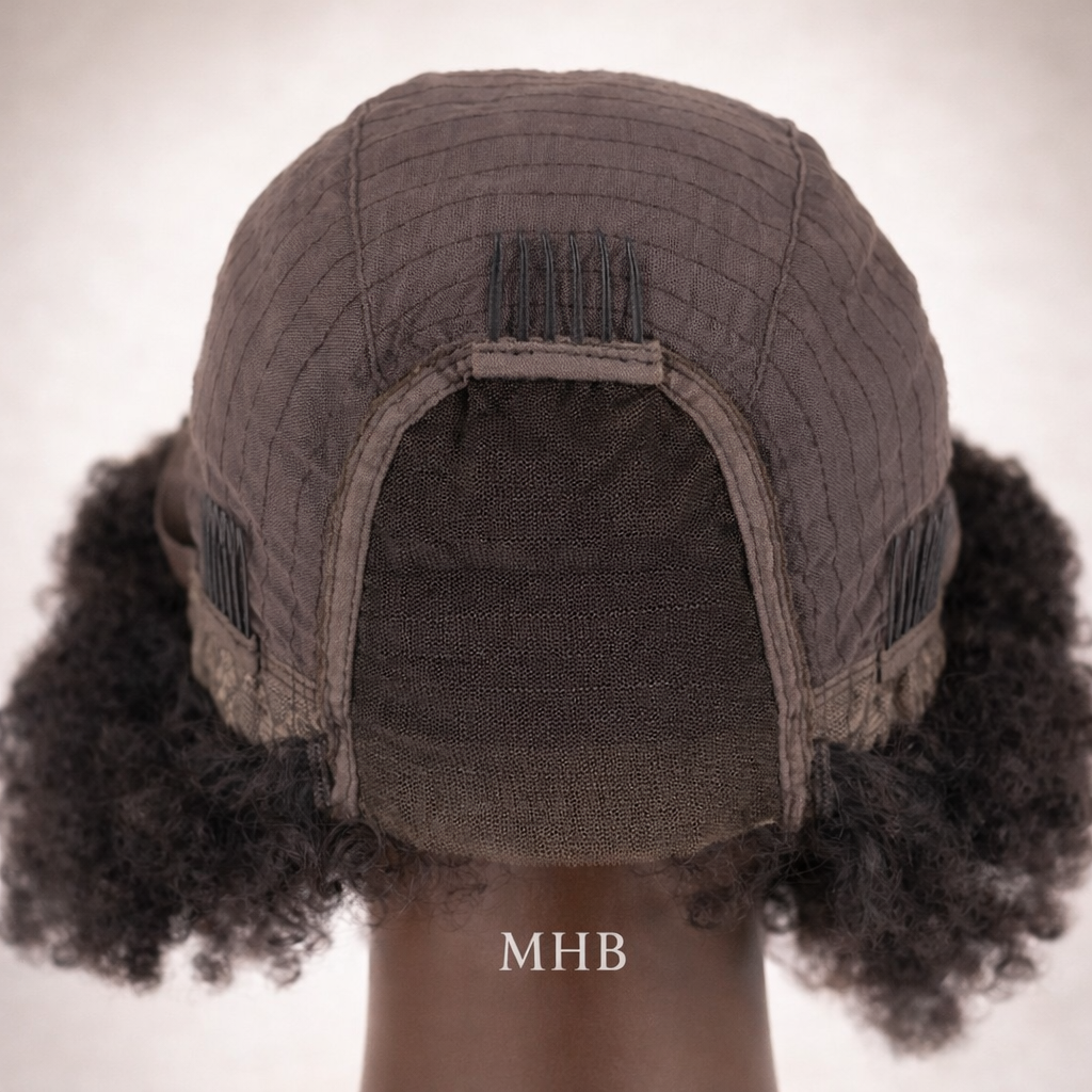 Brown wig cap with curly hair on a neutral background, featuring the brand 'MHB'.